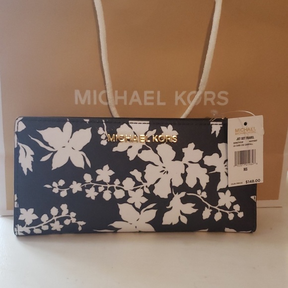 Michael Kors Handbags - Michael Kors Jet Set Travel NWT SALE!